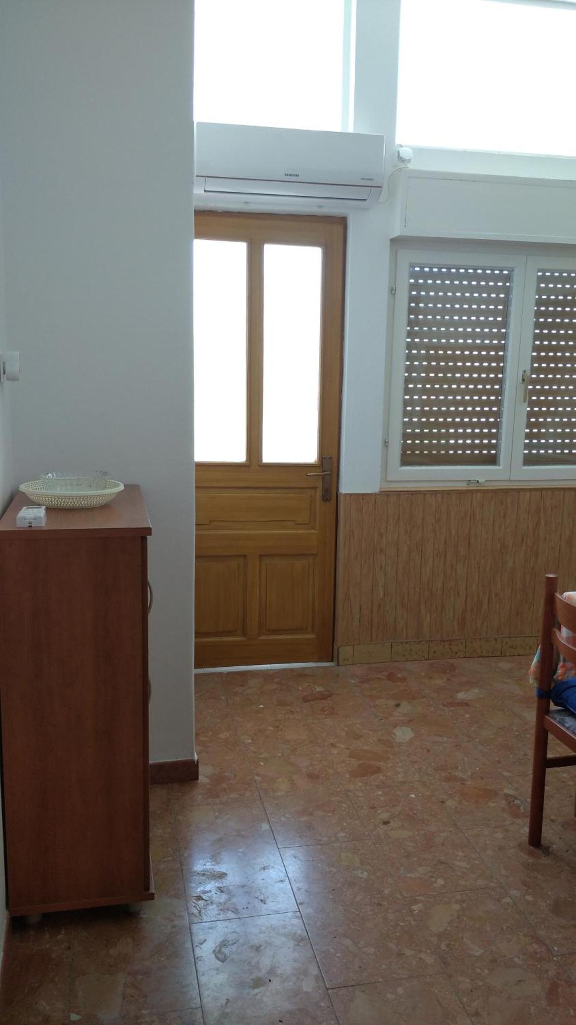 Moki Apartment Vis Bilik gambar