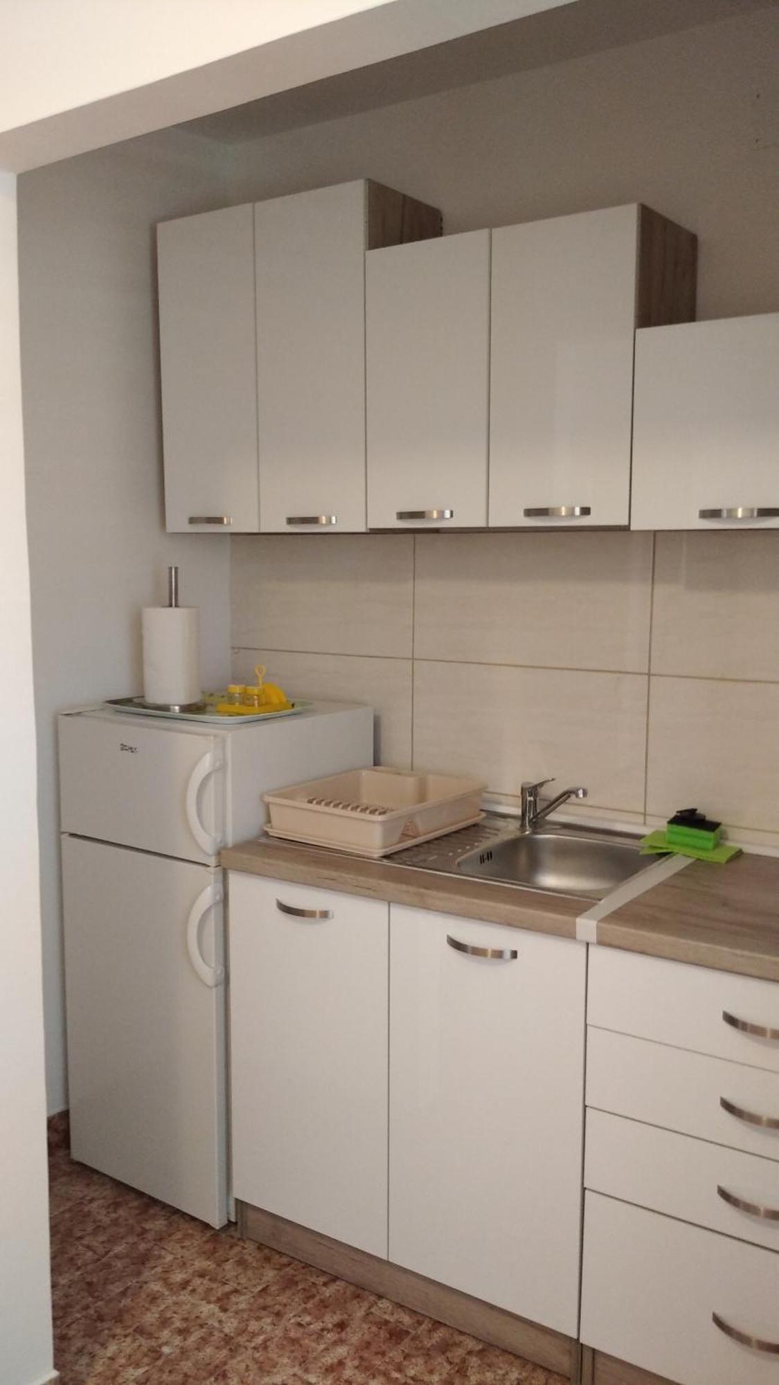 Moki Apartment Vis Bilik gambar